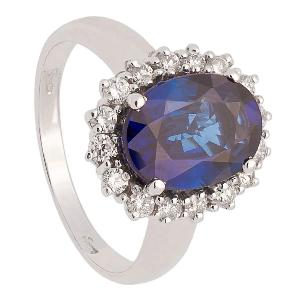 Sortija de oro blanco con zafiro central y corona de diamantes - 0355
